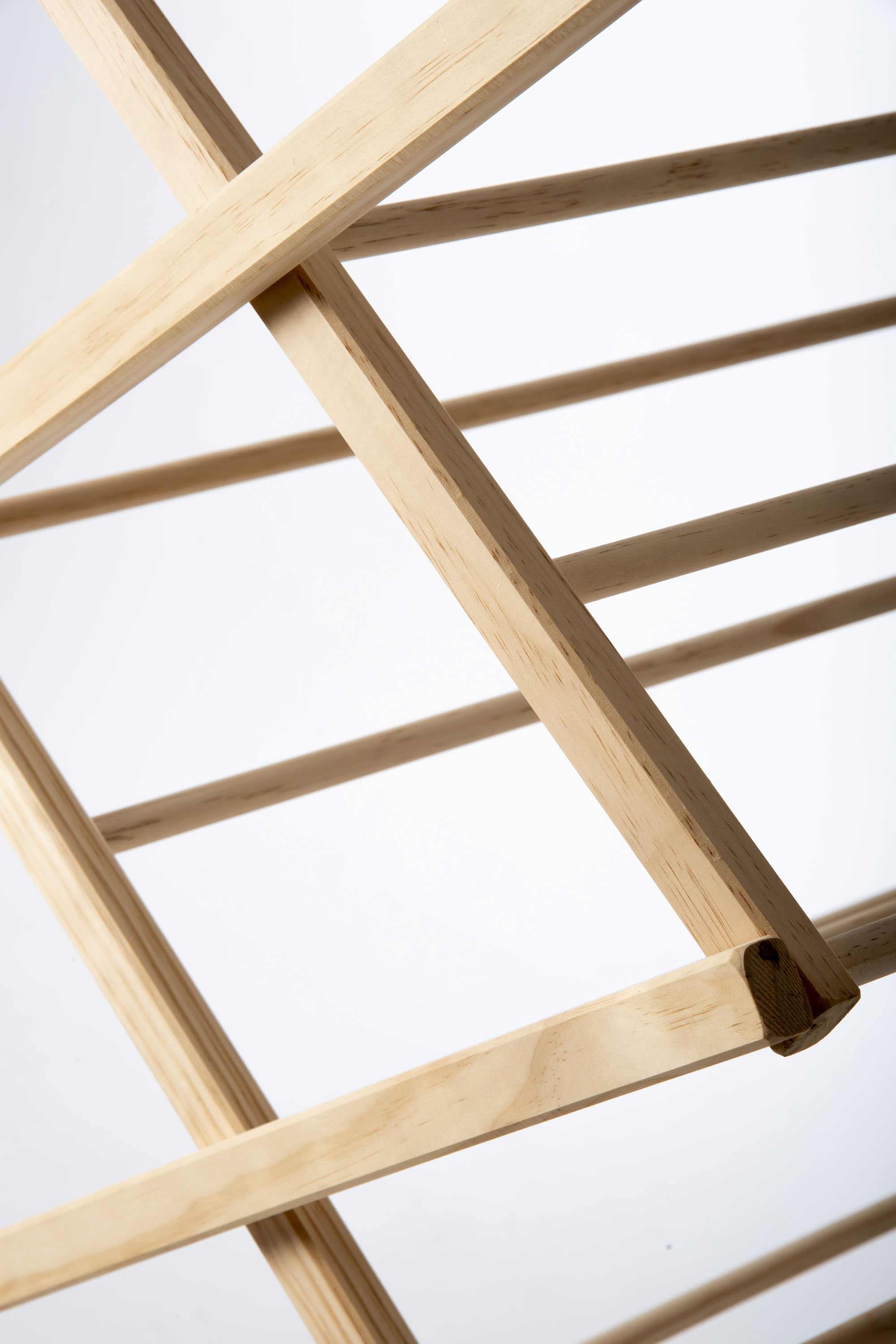 Close-up of a wooden ladder structure on a white background Victoria James Home Eco Deluxe Clothes Airer