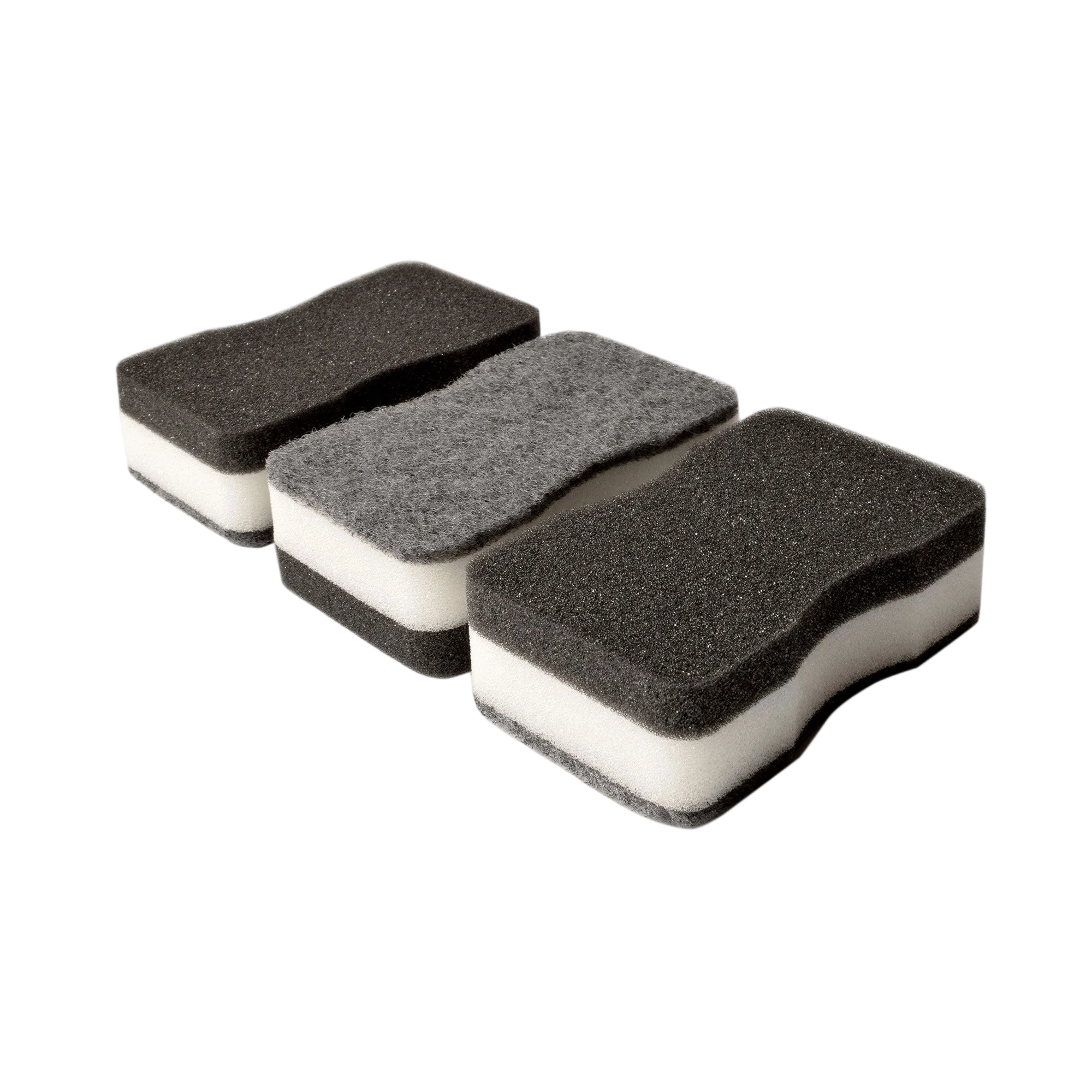 Three sponges with black and white design on a white background