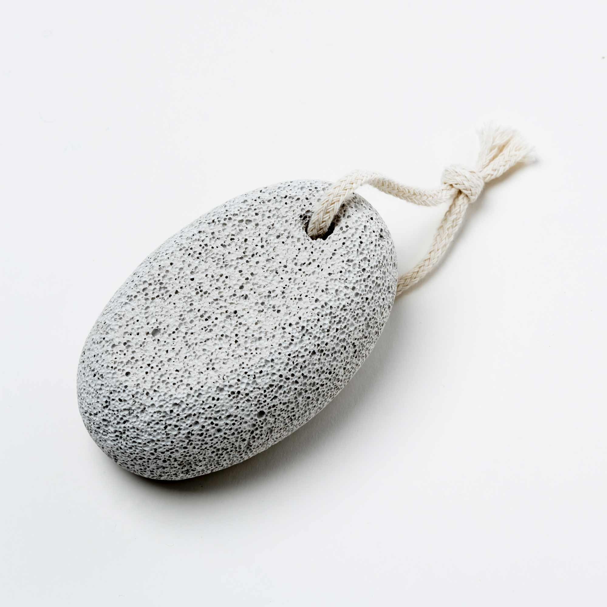 Pumice stone with a rope on a white background. Victoria James Body Pumice Stone