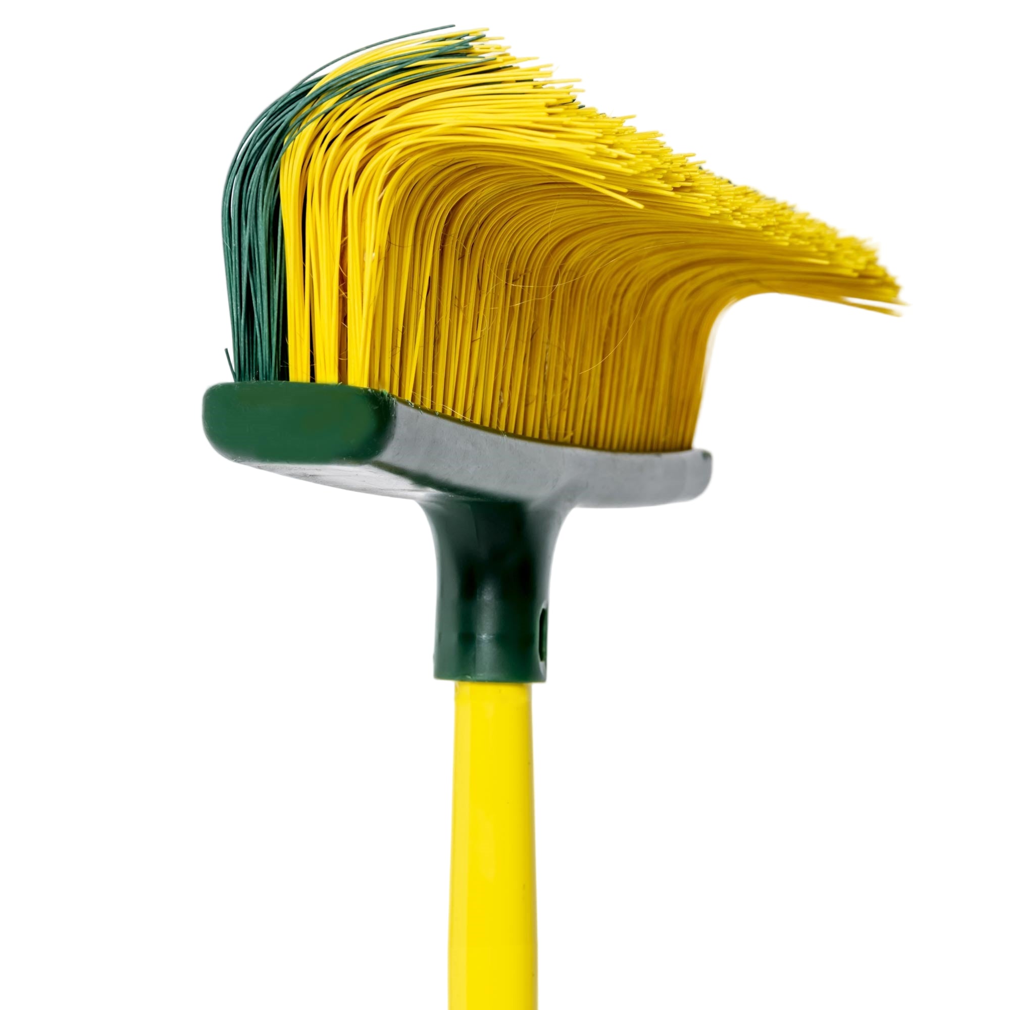 Cleaning brush with yellow bristles on a white background. Simply Clean 2IN1 Broom & Rake